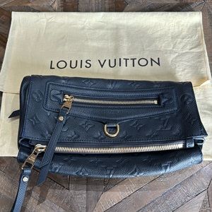 Louis Vuitton 10 Pettilante, monogram empreinte leather flap clutch in blue